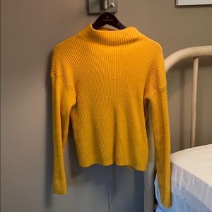 Yellow turtleneck